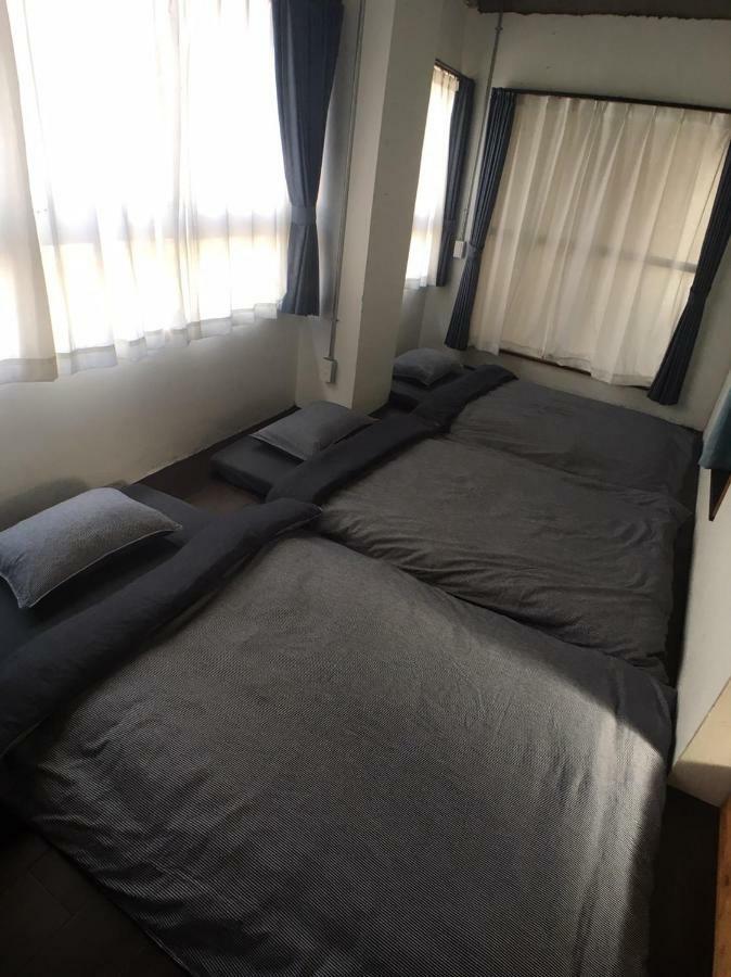 Guest House Golden Mile Hostel Амами Екстериор снимка