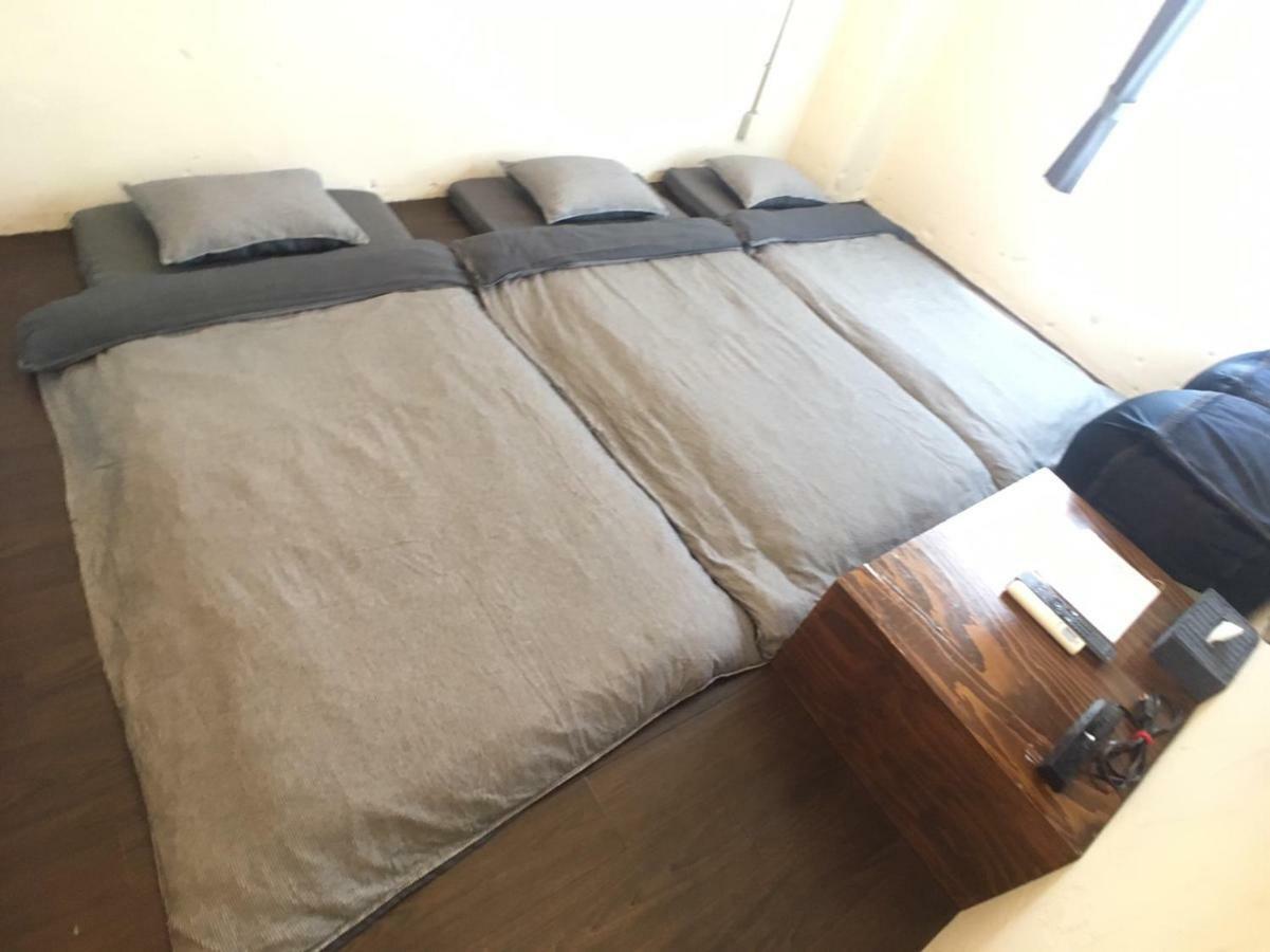 Guest House Golden Mile Hostel Амами Екстериор снимка