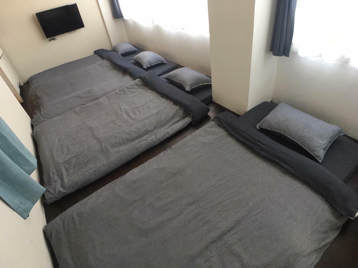 Guest House Golden Mile Hostel Амами Екстериор снимка